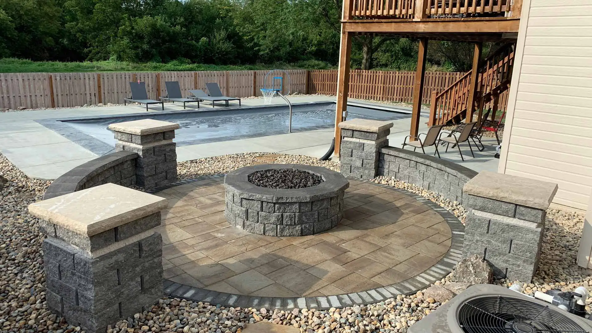 Hardscapes built beside pool in Omaha, NE.