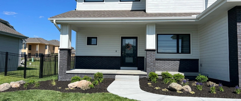Mulch and plantings installed for a landscape bed in Waterloo, NE.