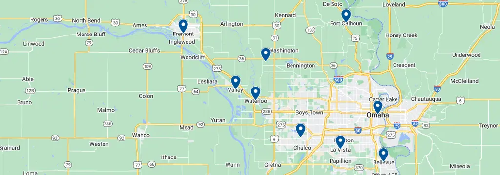 Lush custom hardscaping landscaping showing wide beautiful yard with pathways and greenery at golden hour